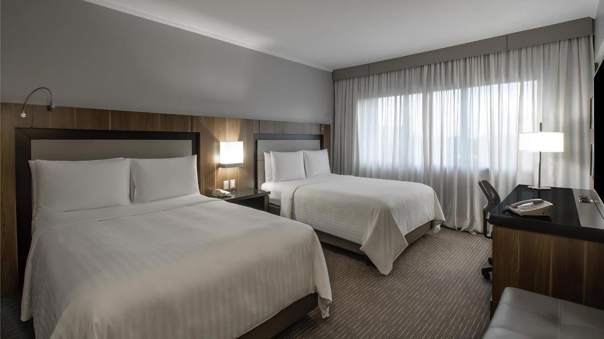 상파울로 에어포트 메리어트 호텥 호텔 과룰류스 외부 사진 A typical guest room at the Hilton San Francisco Airport