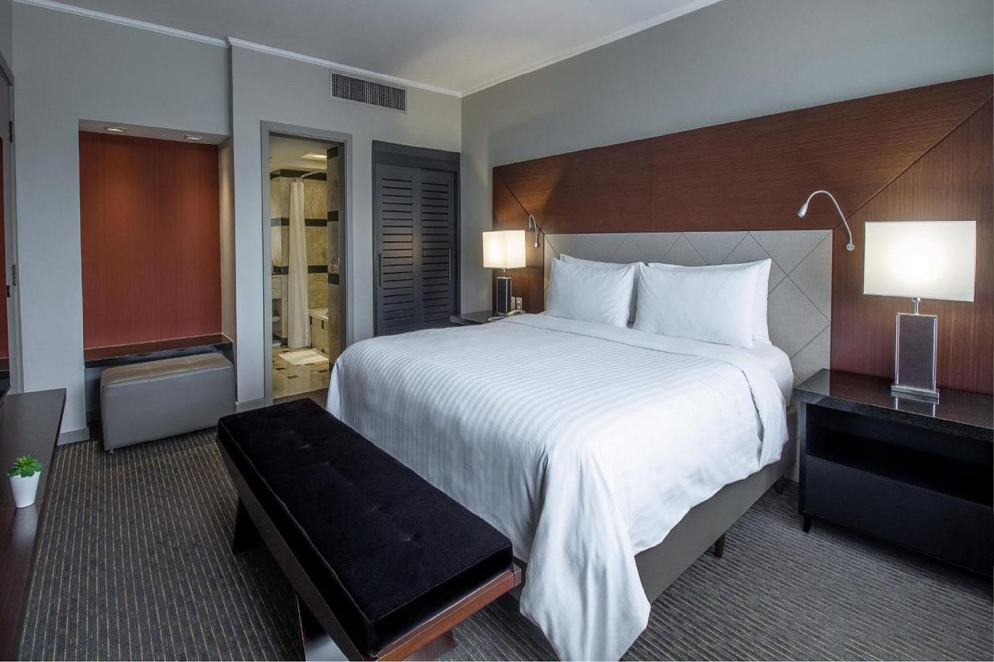 상파울로 에어포트 메리어트 호텥 호텔 과룰류스 외부 사진 A bedroom at the Four Seasons Hotel